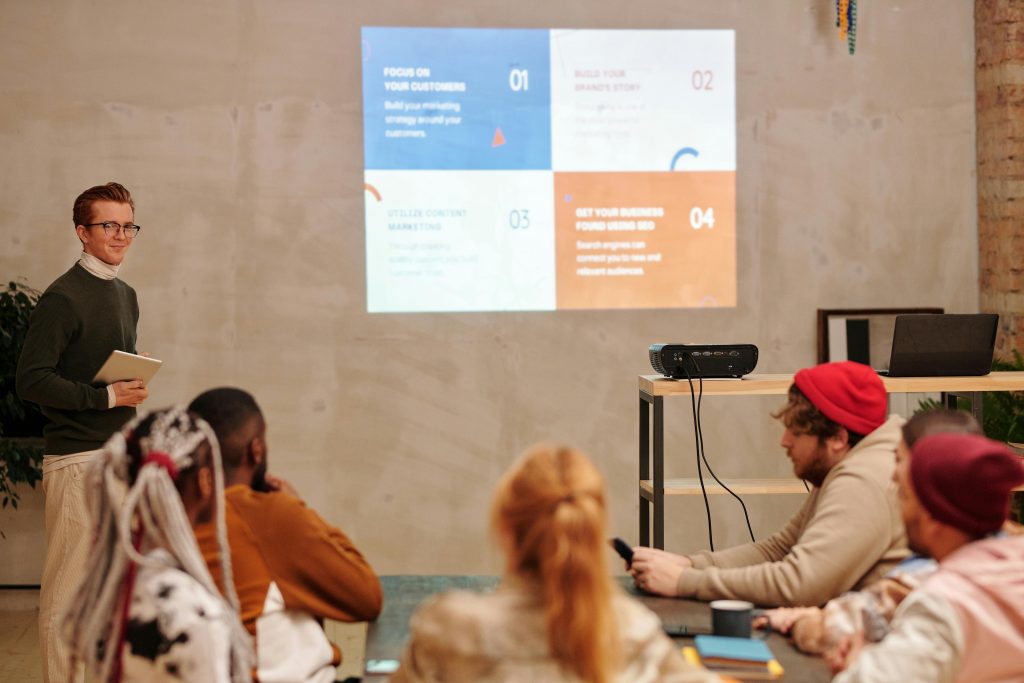 Team engaged in a business presentation with a focus on marketing strategies.